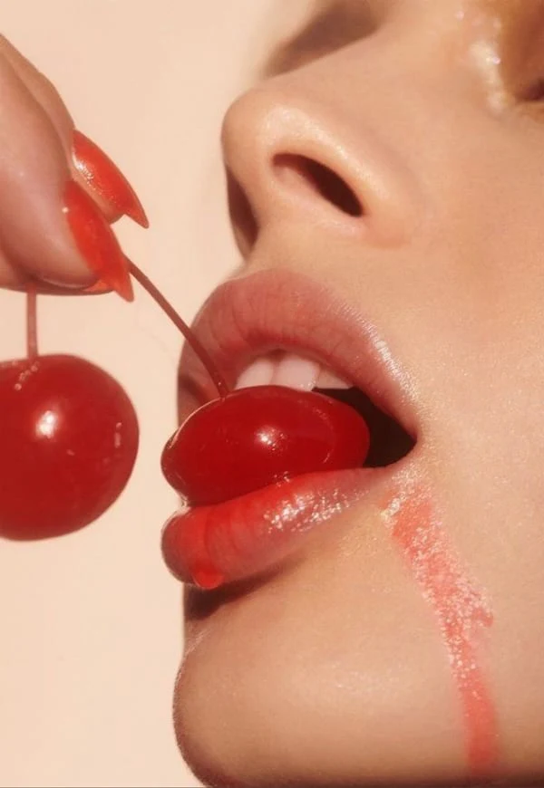Red lips and a cherry